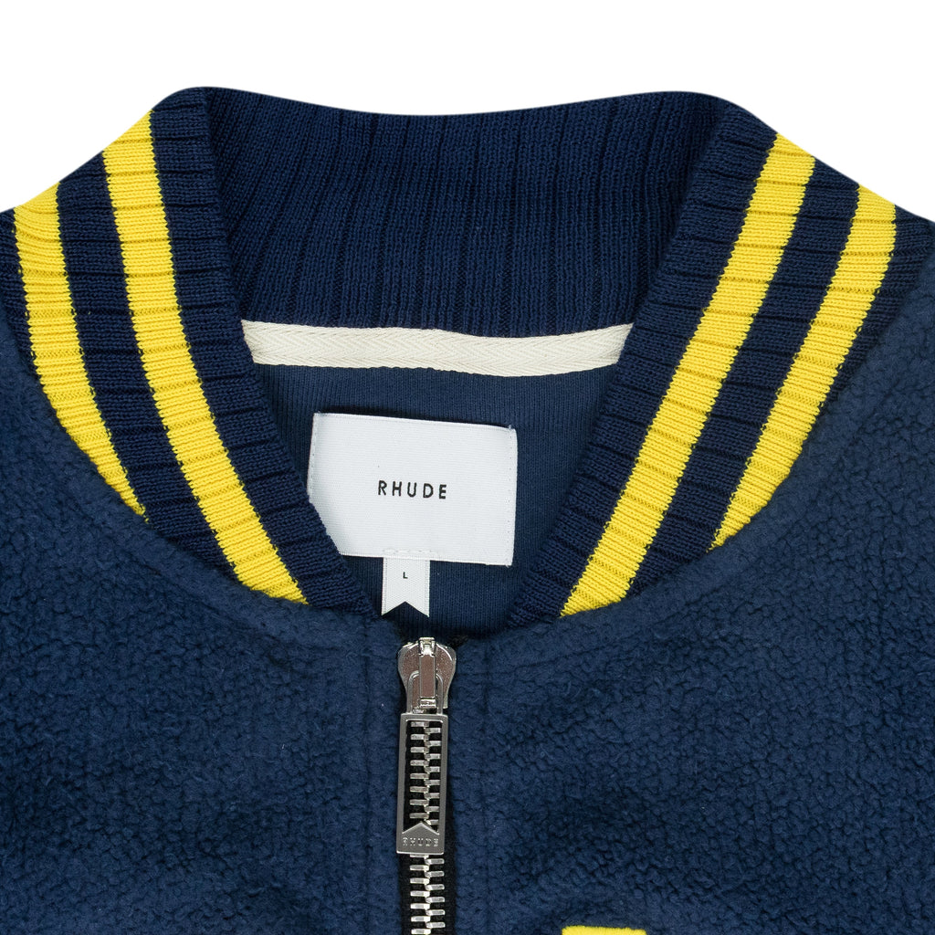 NAVY OVERSIZED LOGO TERRY VARSITY JACKET