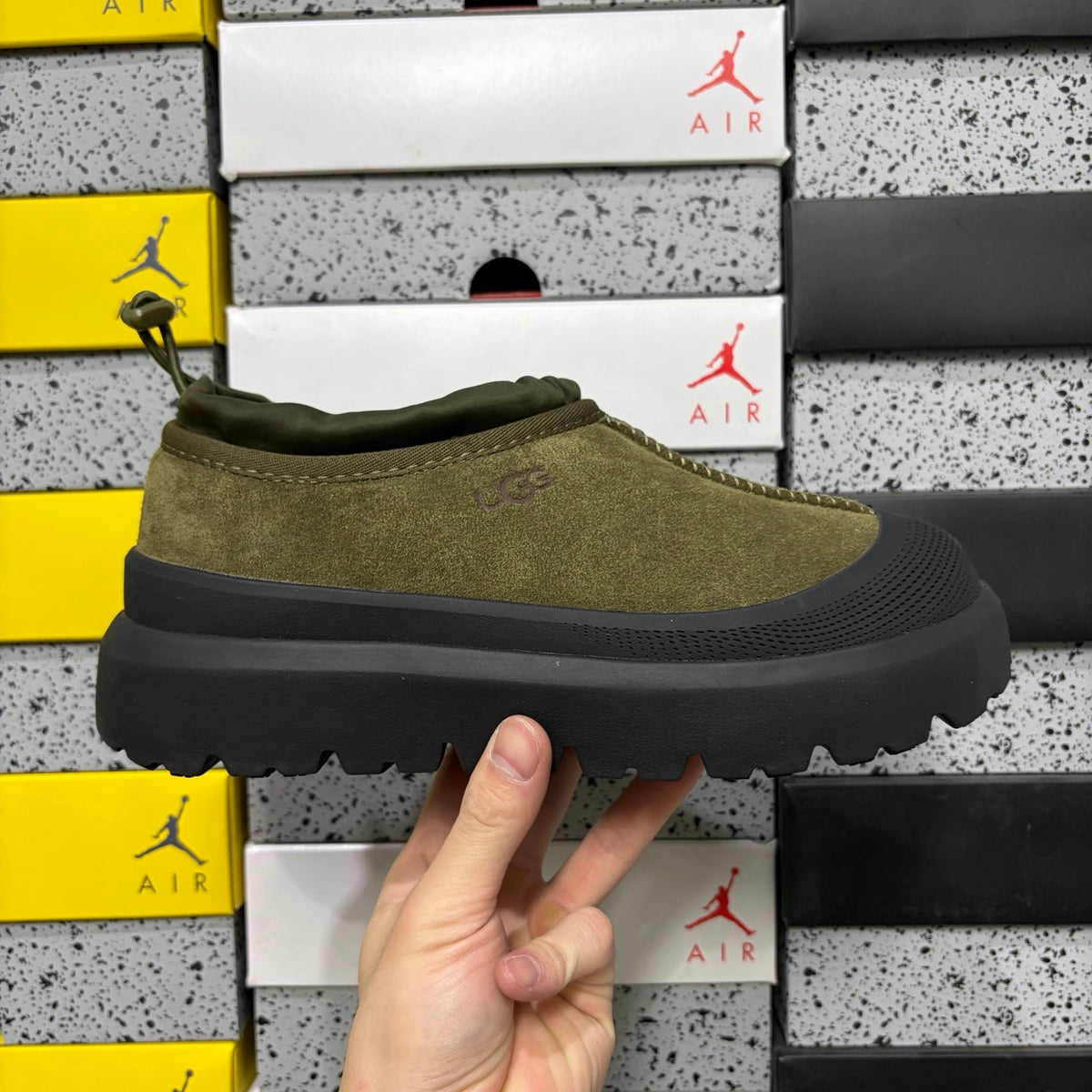 UGG Neumeel Deco Slip-On – Suede Moccasin Sneaker with Black Lug Sole & Tonal Drawstring in Olive
