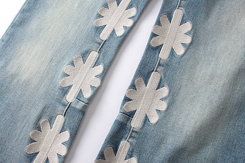LOSTSHDWS Light Blue Daisy Applique Flared Jeans